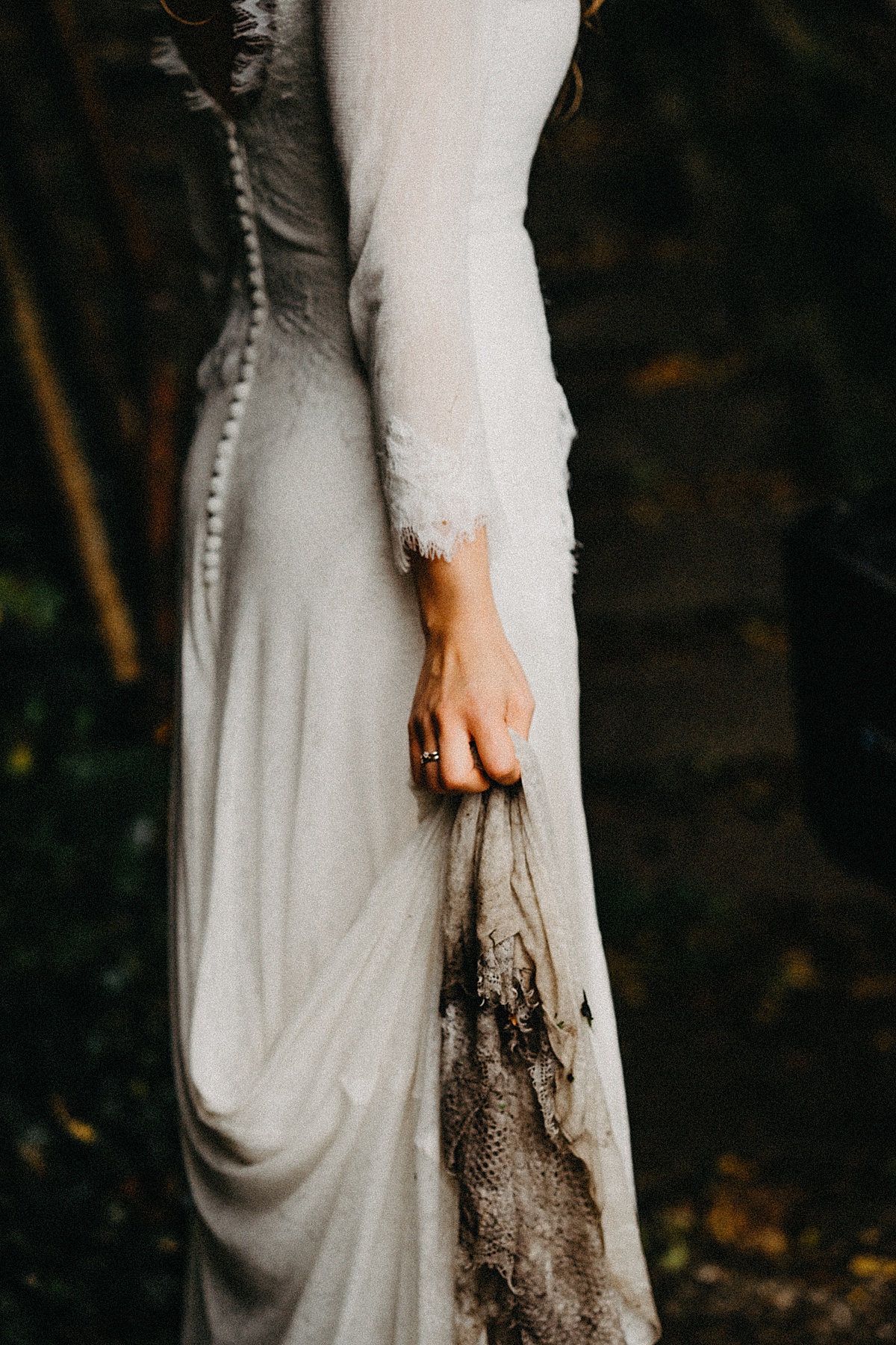 Muddy wedding dress on a rainy wedding day.